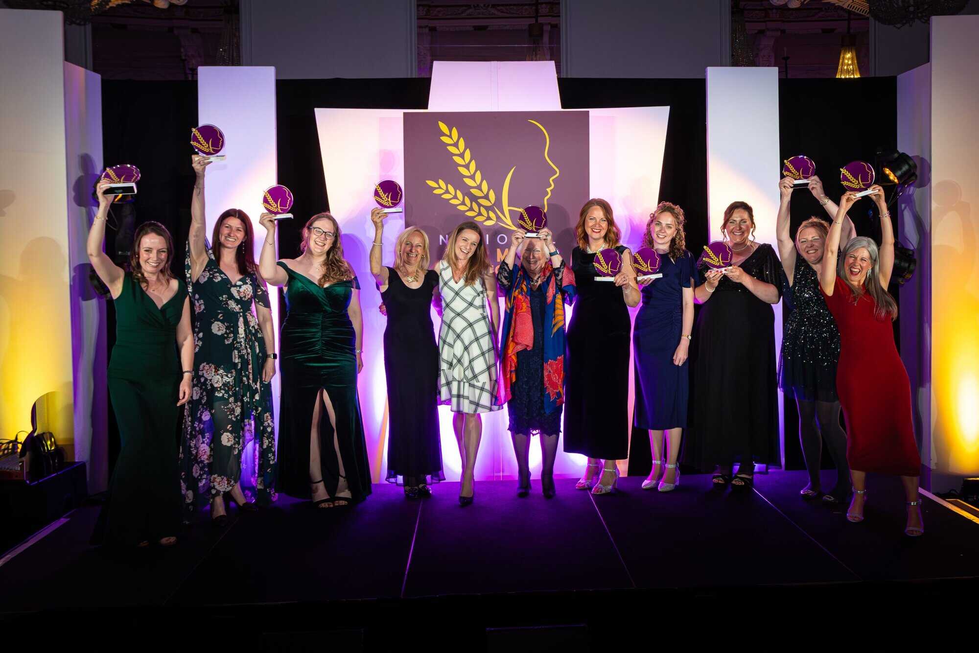 EnviroSystems team celebrating two awards at a recent event.