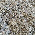 Close-up of StableBoost equine bedding showing soft, absorbent material for horse comfort and hygien.